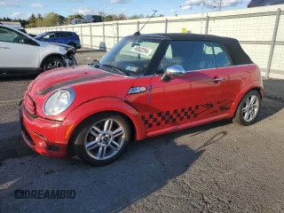 2011 MINI Convertible with VIN WMWZN3C55BT133269, listed as a Copart auction lot 74062294 with 48,582 mi miles and Salvage Title. Bid and sale history available at DreamBid. Image 1.