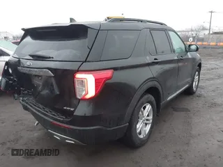 2023 Ford Explorer XLT with VIN 1FMSK8DH8PGA89282, listed as a IAAI auction lot 41453791 with 30,309 mi miles and . Bid and sale history available at carsss.com. Image 4.
