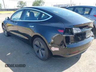2018 Tesla Model 3 Long Range Battery with VIN 5YJ3E1EA7JF057031, listed as a IAAI auction lot 42139832 with 92,618 mi miles and . Bid and sale history available at DreamBid. Image 3.