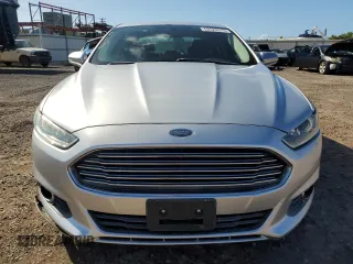 2013 Ford Fusion SE Hybrid z VIN 3FA6P0LU8DR325849, wystawiony jako Copart lot #53520515 z przebiegiem 93 615 mil mil oraz Czysty tytuł • Clean title. Historia ofert i sprzedaży dostępna na DreamBid. Obrazek 5.