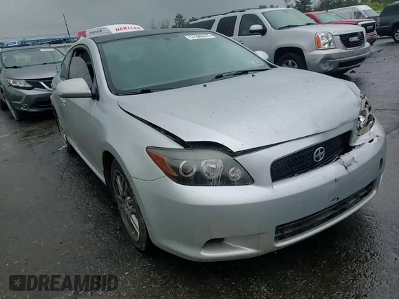 2008 Scion tC Spec z VIN JTKDE167280259526, wystawiony jako Copart lot #57526575 z przebiegiem 164 428 mil mil oraz Szkoda całkowita • Salvage title. Historia ofert i sprzedaży dostępna na DreamBid. Obrazek 13.