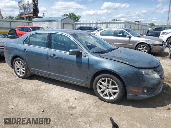 2012 Ford Fusion SEL z VIN 3FAHP0JG7CR297174, wystawiony jako Copart lot #55469005 z przebiegiem 129 434 mil mil oraz Szkoda całkowita • Salvage title. Historia ofert i sprzedaży dostępna na DreamBid. Obrazek 4.