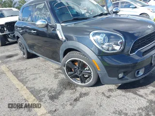 2014 MINI Countryman S with VIN WMWZC3C56EWP27880, listed as a IAAI auction lot 38577048 with 96,812 mi miles and . Bid and sale history available at DreamBid. Image 6.