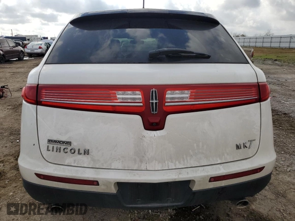 2014 Lincoln MKT with VIN 2LMHJ5FK3EBL54865, listed as a Copart auction lot 43979445 with 54,820 mi miles and Salvage Title. Bid and sale history available at DreamBid. Image 6.