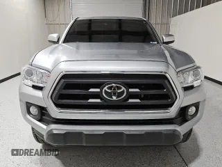 2022 Toyota Tacoma SR5 z VIN 3TMAZ5CN8NM183375, wystawiony jako Copart lot #57228025 z przebiegiem 81 738 mil mil oraz Czysty tytuł • Clean title. Historia ofert i sprzedaży dostępna na DreamBid. Obrazek 5.