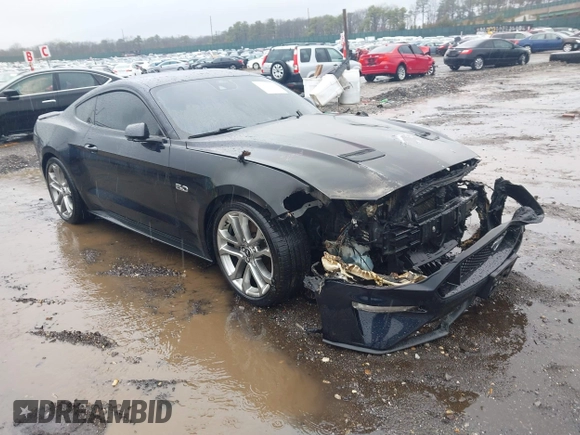 2021 Ford Mustang GT z VIN 1FA6P8CF5M5138913, wystawiony jako IAAI lot #41821447 z przebiegiem 26 365 mil mil oraz . Historia ofert i sprzedaży dostępna na DreamBid. Obrazek 1.