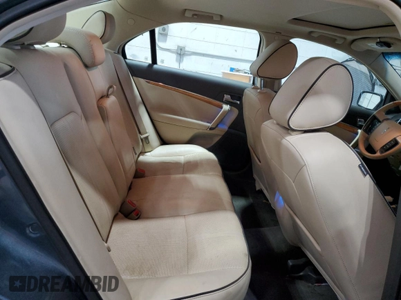 2011 Lincoln MKZ Hybrid z VIN 3LNDL2L33BR755653, wystawiony jako Copart lot #57050605 z przebiegiem 62 424 mil mil oraz Szkoda całkowita • Salvage title. Historia ofert i sprzedaży dostępna na DreamBid. Obrazek 10.