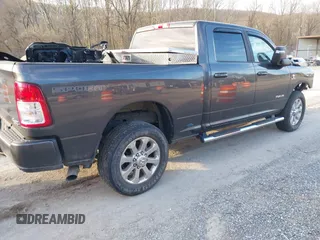 2023 Ram 2500 Big Horn with VIN 3C6UR5DL6PG519124, listed as a IAAI auction lot 41851548 with 10,334 mi miles. Bid and sale history available at carsss.com. Image 4.