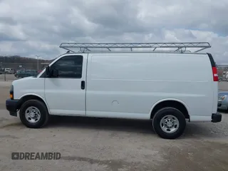 2018 Chevrolet Express Cargo Van with VIN 1GCWGAFP6J1336229, listed as a IAAI auction lot 42022722 with 99,005 mi miles. Bid and sale history available at carsss.com. Image 14.