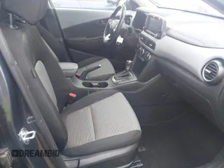 2021 Hyundai Kona SEL with VIN KM8K22AA6MU613871, listed as a IAAI auction lot 42078925 with 66,739 mi miles and . Bid and sale history available at carsss.com. Image 5.