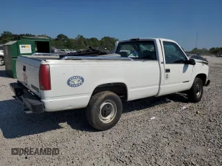 1995 GMC Sierra 1500 with VIN 1GDGC24K0SZ540665, listed as a Copart auction lot 67076364 with 129,534 mi miles and Salvage Title. Bid and sale history available at DreamBid. Image 3.