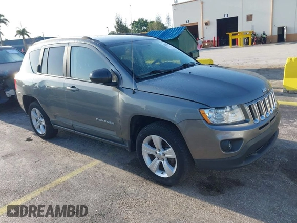 2011 Jeep Compass with VIN 1J4NT1FA4BD213994, listed as a IAAI auction lot 42020375 with 84,409 mi miles. Bid and sale history available at carsss.com. Image 1.