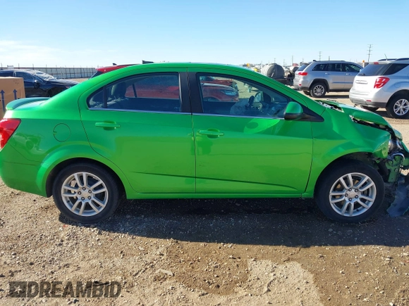 2014 Chevrolet Sonic LT z VIN 1G1JC5SH3E4219619, wystawiony jako IAAI lot #41208791 z przebiegiem 122 161 mil mil oraz . Historia ofert i sprzedaży dostępna na DreamBid. Obrazek 12.