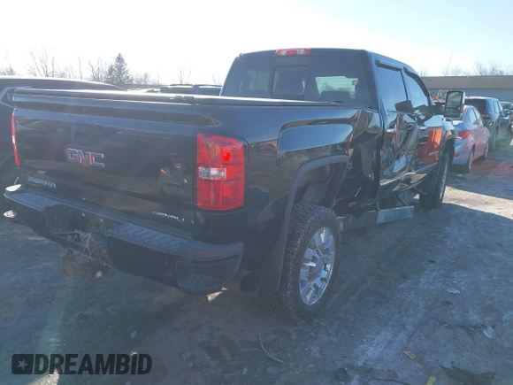 2019 GMC Sierra 2500HD Denali with VIN 1GT12SEYXKF224711, listed as a IAAI auction lot 41407508 with 77,158 mi miles. Bid and sale history available at carsss.com. Image 4.