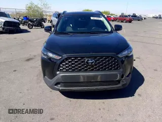 2022 Toyota Corolla Cross LE with VIN 7MUCAABG1NV033299, listed as a Copart auction lot 58018825 with 28,138 mi miles and Salvage title. Bid and sale history available at DreamBid. Image 11.