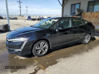 2018 Honda Clarity Touring z VIN JHMZC5F37JC007376, wystawiony jako Copart lot #52385225 z przebiegiem 64 062 mil mil oraz Szkoda całkowita • Salvage title. Historia ofert i sprzedaży dostępna na DreamBid. Obrazek 1.