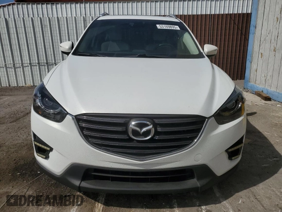 2016 Mazda CX-5 Grand Touring with VIN JM3KE4DY9G0662369, listed as a Copart auction lot 53169895 with 160,784 mi miles and Salvage Title. Bid and sale history available at carsss.com. Image 5.