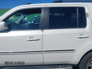 2011 Honda Pilot Touring with VIN 5FNYF4H97BB067954, listed as a IAAI auction lot 41832617 with 141,141 mi miles. Bid and sale history available at carsss.com. Image 14.