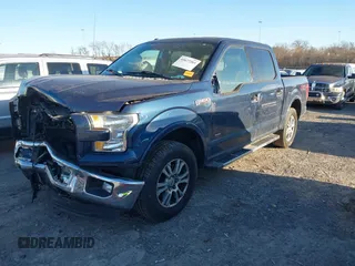2015 Ford F-150 XLT with VIN 1FTEW1EP7FFD00589, listed as a IAAI auction lot 41677203 with 156,064 mi miles. Bid and sale history available at carsss.com. Image 17.