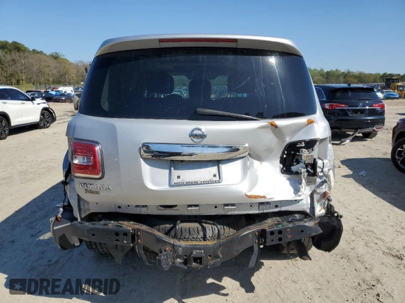 2018 Nissan Armada SL z VIN JN8AY2NC8JX500366, wystawiony jako Copart lot #52125215 z przebiegiem 132 818 mil mil oraz Szkoda całkowita • Salvage title. Historia ofert i sprzedaży dostępna na DreamBid. Obrazek 6.