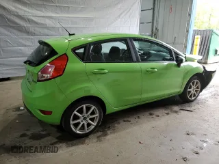 2015 Ford Fiesta SE z VIN 3FADP4EJ2FM215834, wystawiony jako Copart lot #58052045 z przebiegiem 99 842 mil mil oraz Czysty tytuł • Clean title. Historia ofert i sprzedaży dostępna na DreamBid. Obrazek 3.