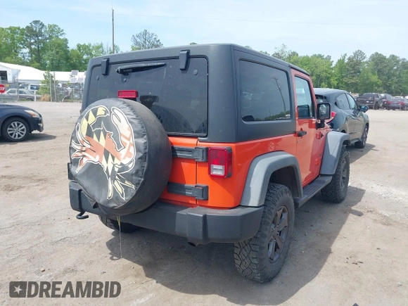 2015 Jeep Wrangler Sport with VIN 1C4AJWAG7FL667462, listed as a IAAI auction lot 42134109 with 85,651 mi miles and . Bid and sale history available at carsss.com. Image 4.