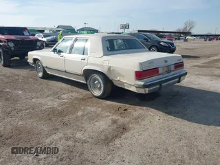 1991 Mercury Grand Marquis z VIN 2MECM75F7MX637786, wystawiony jako IAAI lot #41429297 z przebiegiem 12 512 mil mil oraz . Historia ofert i sprzedaży dostępna na DreamBid. Obrazek 3.