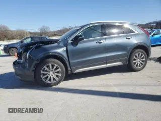 2021 Cadillac XT4 AWD Premium Luxury with VIN 1GYFZDR47MF002175, listed as a Copart auction lot 48303665 with 94,698 mi miles and Salvage Title. Bid and sale history available at carsss.com. Image 1.
