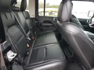 2023 Jeep Wrangler Sahara z VIN 1C4JJXP62PW514489, wystawiony jako Copart lot #51811585 z przebiegiem 39 174 mil mil oraz Szkoda całkowita • Salvage title. Historia ofert i sprzedaży dostępna na DreamBid. Obrazek 11.