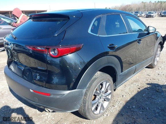2021 Mazda CX-30 Select with VIN 3MVDMABLXMM254691, listed as a IAAI auction lot 41823081 with 80,082 mi miles. Bid and sale history available at carsss.com. Image 4.