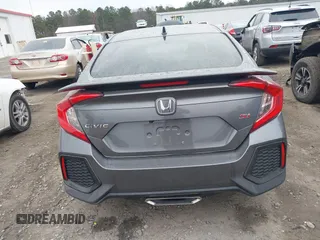 2019 Honda Civic Si z VIN 2HGFC1E52KH701117, wystawiony jako IAAI lot #41722505 z przebiegiem 64 085 mil mil oraz . Historia ofert i sprzedaży dostępna na DreamBid. Obrazek 16.