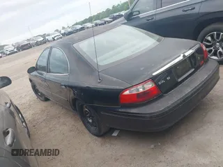 2004 Mercury Sable GS with VIN 1MEFM50U34G613224, listed as a IAAI auction lot 42079216 with 202,360 mi miles. Bid and sale history available at carsss.com. Image 3.