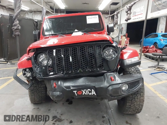 2022 Jeep Gladiator Altitude z VIN 1C6HJTAGXNL117353, wystawiony jako IAAI lot #42427921 z przebiegiem 28 801 mil mil oraz . Historia ofert i sprzedaży dostępna na DreamBid. Obrazek 12.