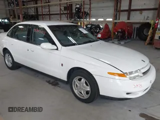 2001 Saturn LS z VIN 1G8JU52F71Y579153, wystawiony jako IAAI lot #41853875 z przebiegiem 170 385 mil mil oraz . Historia ofert i sprzedaży dostępna na DreamBid. Obrazek 1.