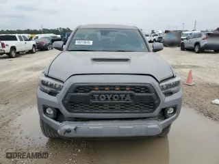 2021 Toyota Tacoma 4WD SR5 with VIN 3TMDZ5BN5MM116584, listed as a Copart auction lot 50918845 with 23,041 mi miles and Salvage Title. Bid and sale history available at carsss.com. Image 5.