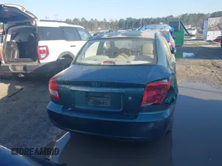 2003 Kia Rio with VIN KNADC125836238197, listed as a IAAI auction lot 41781730 with 138,384 mi miles. Bid and sale history available at carsss.com. Image 16.