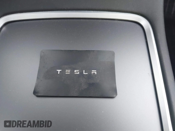 2021 Tesla Model Y Long Range with VIN 5YJYGDEE7MF198867, listed as a IAAI auction lot 42117463 with 79,759 mi miles and . Bid and sale history available at DreamBid. Image 11.