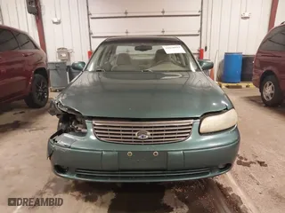1998 Chevrolet Malibu LS with VIN 1G1NE52M6W6104642, listed as a IAAI auction lot 41636923 with 116,944 mi miles. Bid and sale history available at carsss.com. Image 13.