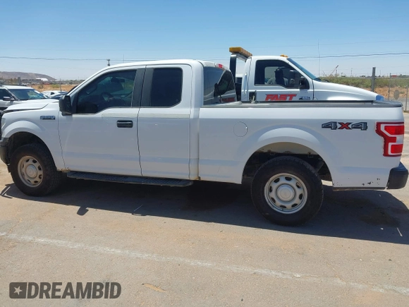 2018 Ford F-150 XL with VIN 1FTFX1E5XJKD86996, listed as a IAAI auction lot 42256819 with 141,798 mi miles and . Bid and sale history available at DreamBid. Image 14.