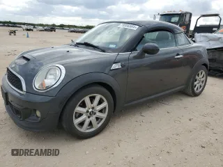 2014 MINI Coupe S z VIN WMWSX3C59ET409209, wystawiony jako Copart lot #78886564 z przebiegiem 118 632 mil mil oraz Tytuł czysty. Historia ofert i sprzedaży dostępna na DreamBid. Obrazek 1.