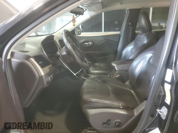 2014 Jeep Cherokee Trailhawk with VIN 1C4PJMBB8EW171116, listed as a Copart auction lot 60107215 with 168,979 mi miles and Salvage title. Bid and sale history available at DreamBid. Image 7.