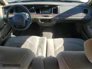 2000 Ford Crown Victoria with VIN 2FAFP73W4YX216080, listed as a Copart auction lot 53774835 with 144,404 mi miles and Salvage Title. Bid and sale history available at carsss.com. Image 8.