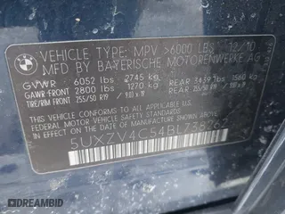 2011 BMW X5 35i with VIN 5UXZV4C54BL738262, listed as a IAAI auction lot 41633474 with 173,914 mi miles. Bid and sale history available at carsss.com. Image 9.