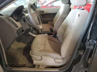 2009 Ford Focus SE z VIN 1FAHP35NX9W221299, wystawiony jako Copart lot #55169125 z przebiegiem 117 477 mil mil oraz Szkoda całkowita • Salvage title. Historia ofert i sprzedaży dostępna na DreamBid. Obrazek 7.