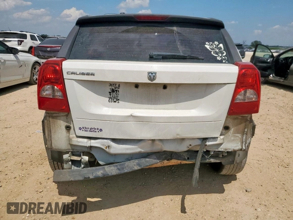 2008 Dodge Caliber SE z VIN 1B3HB28B18D746591, wystawiony jako Copart lot #58188955 z przebiegiem 196 836 mil mil oraz Szkoda całkowita • Salvage title. Historia ofert i sprzedaży dostępna na DreamBid. Obrazek 6.