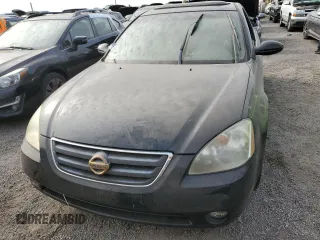 2002 Nissan Altima SL with VIN 1N4AL11D42C201779, listed as a Copart auction lot 76189094 with 65,147 mi miles and Salvage Title. Bid and sale history available at carsss.com. Image 5.