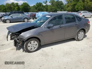 2009 Ford Focus S with VIN 1FAHP34N79W178011, listed as a Copart auction lot 51120195 with 123,930 mi miles and Salvage Title. Bid and sale history available at carsss.com. Image 1.