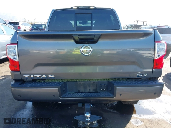 2021 Nissan Titan SV with VIN 1N6AA1EF2MN504611, listed as a IAAI auction lot 41469990 with 81,432 mi miles and . Bid and sale history available at DreamBid. Image 17.