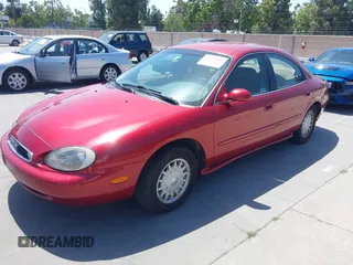 1997 Mercury Sable GS z VIN 1MELM50U6VG651910, wystawiony jako IAAI lot #42494879 z przebiegiem 70 304 mil mil oraz . Historia ofert i sprzedaży dostępna na DreamBid. Obrazek 2.
