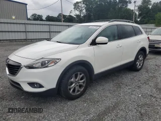 2014 Mazda CX-9 Touring with VIN JM3TB3CVXE0443089, listed as a Copart auction lot 64545195 with 121,229 mi miles and Clean title. Bid and sale history available at DreamBid. Image 1.